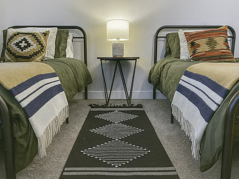 Cozy twin beds designed for rest and relaxation