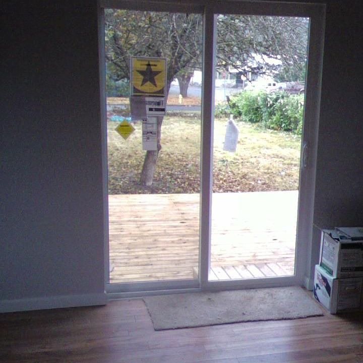 New sliding glass door and cedar deck