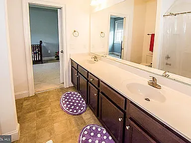 Jack and Jill Bathroom connecting two bedrooms.