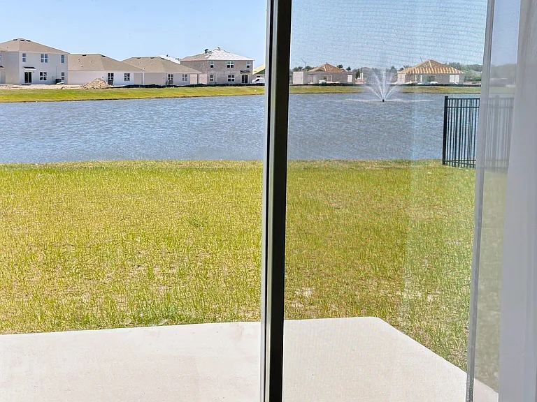 Living room doors with access to the backyard