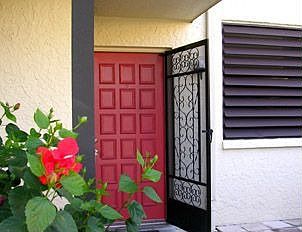 Inviting front entry, fenced patio just on right