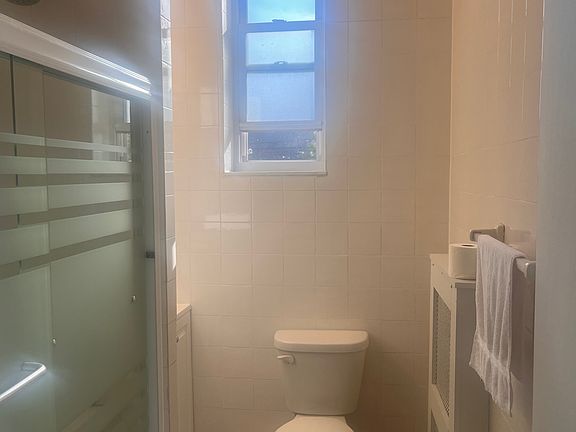 Full Size Bathroom including bathtub and shower