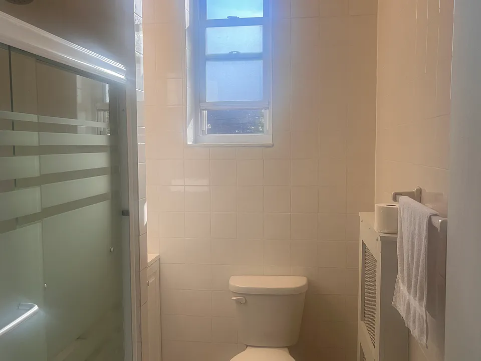 Full Size Bathroom including bathtub and shower