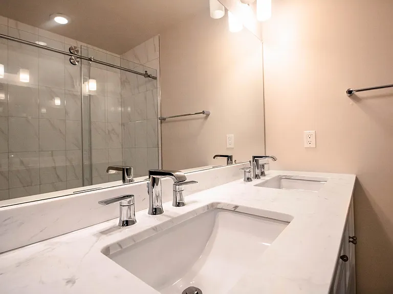 Newly renovated Master bathroom with double sinks.