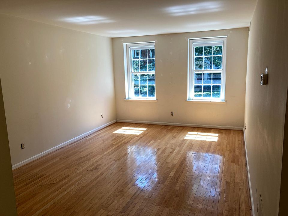 Living Room Before prior to repainting in Antique White
