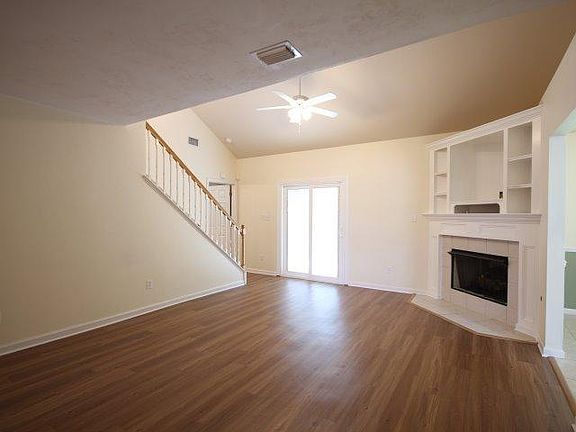 Great Room with loft above. Vaulted ceiling. Gas fireplace.