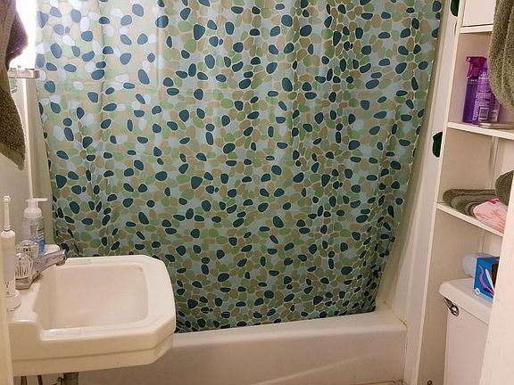 Full bath with tub shower