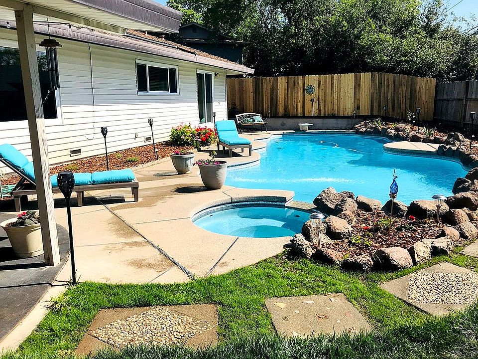Backyard with pool and spa