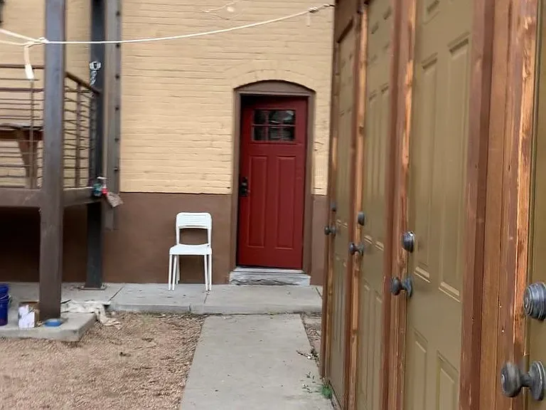 Entrance into basement and additional storage units