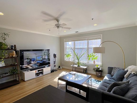 Ceiling Fan .and Dimmable Recessed Lighting in Living Room.