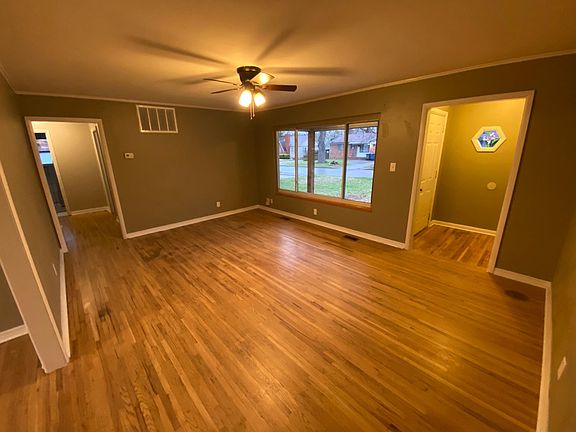 living room, hallway to the bedrooms, dining and kitchen are to the left