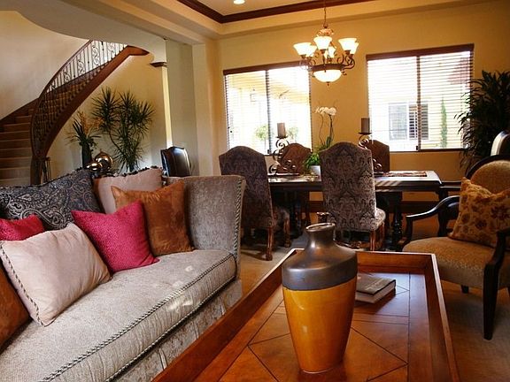 Warm Formal Living and Dining with Fireplace and French Doors to Front Yard