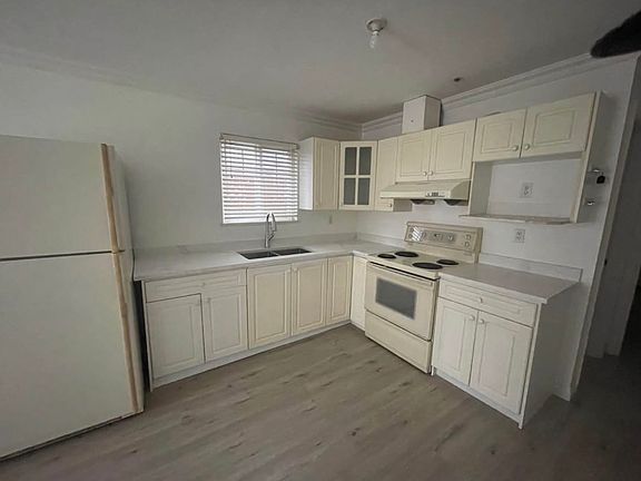 2nd image of 1077 E 62nd Ave #1