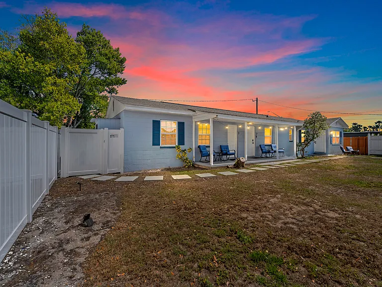 Front porch with porch chairs/table included to enjoy the fenced in backyard