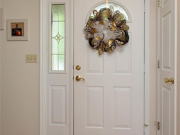 Wood parquet entry foyer.