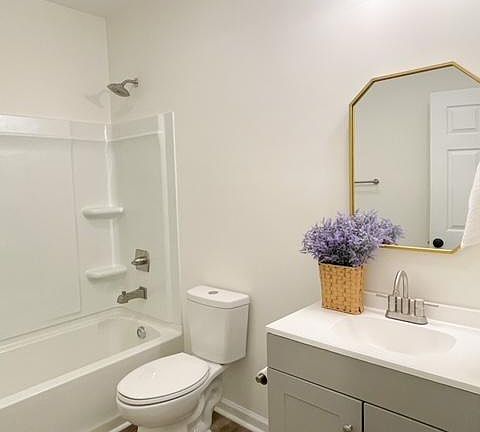 New bathroom. Tub, toilet, vanity, and beautiful mirror and lights all NEW!
