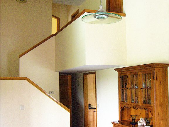 living room with stairs to 2nd floor