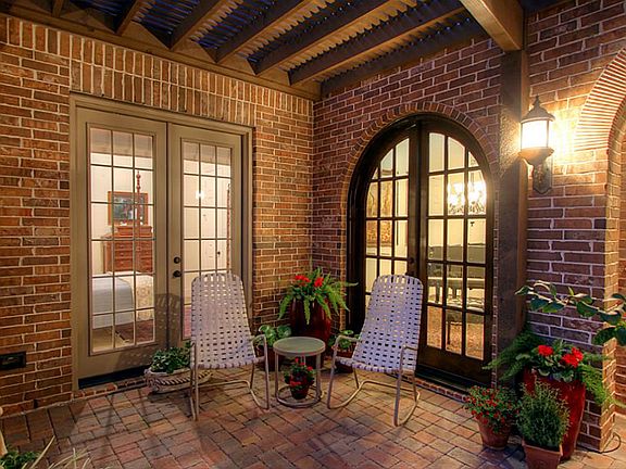 Relax under the pergola, it's the perfect place to sit and enjoy a cup of coffee.