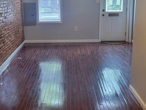 View of Living Room and front door from dinning area.