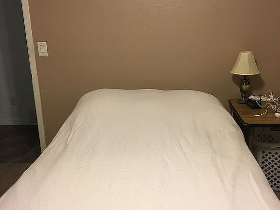 full size bed in bedroom