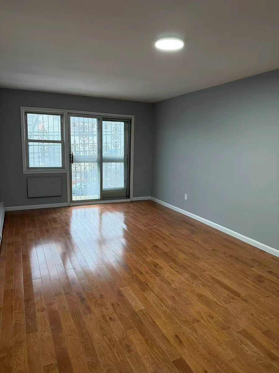 Building Photo - 42-41 65th St #3