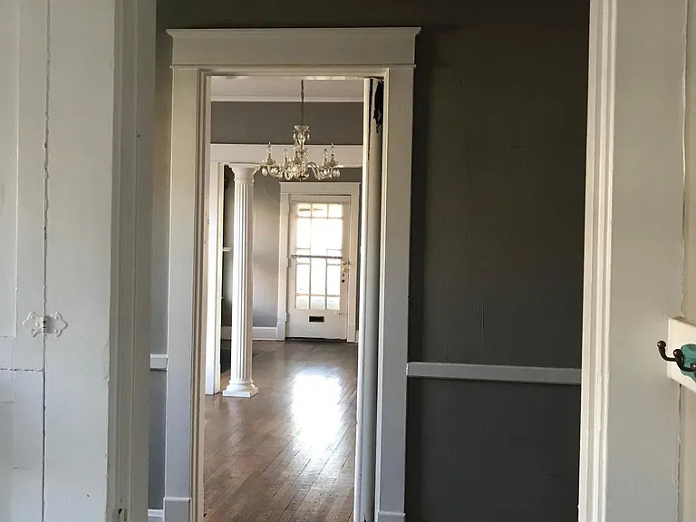 Kitchen looking into dining/living rooms
