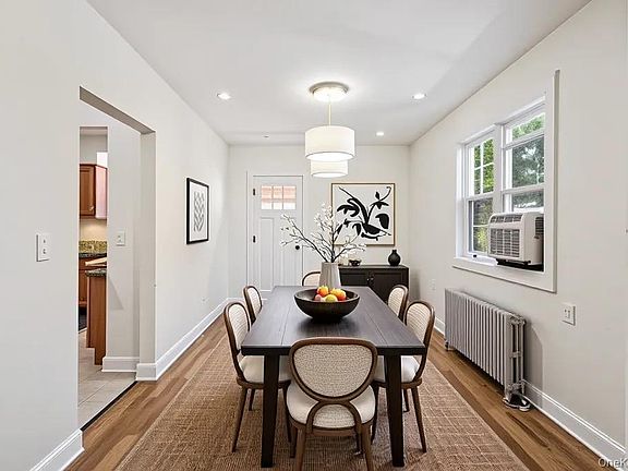 4th image of 61-12 Main Street