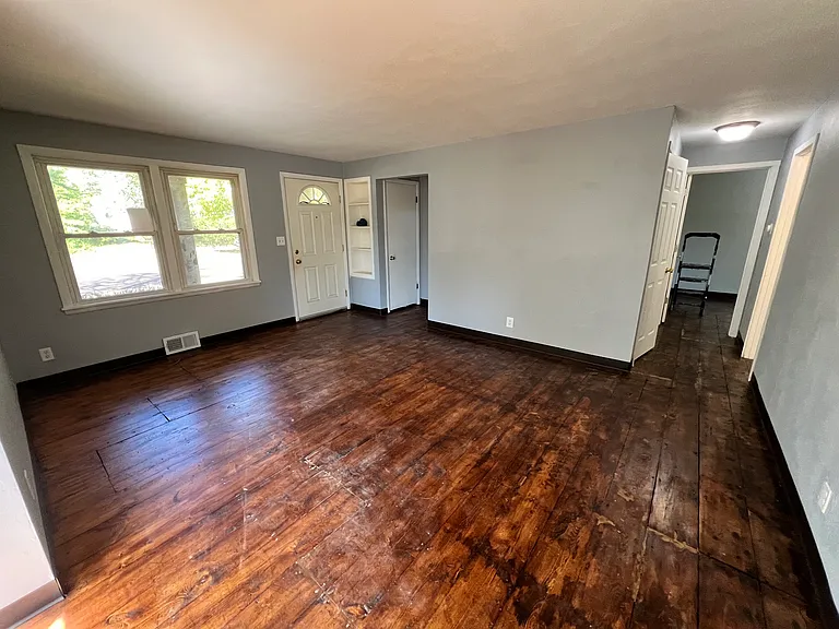 Living room full view with front door