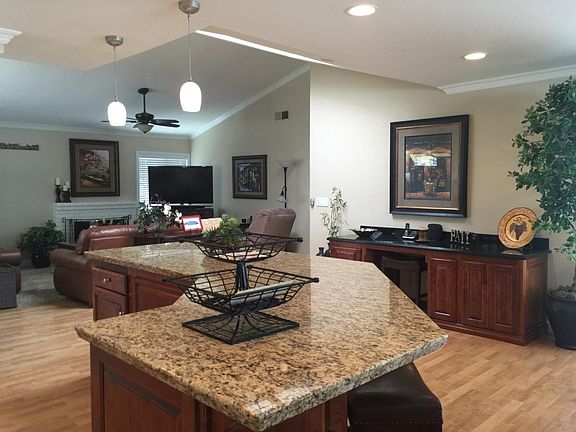 spacious living room/family room kitchen connection