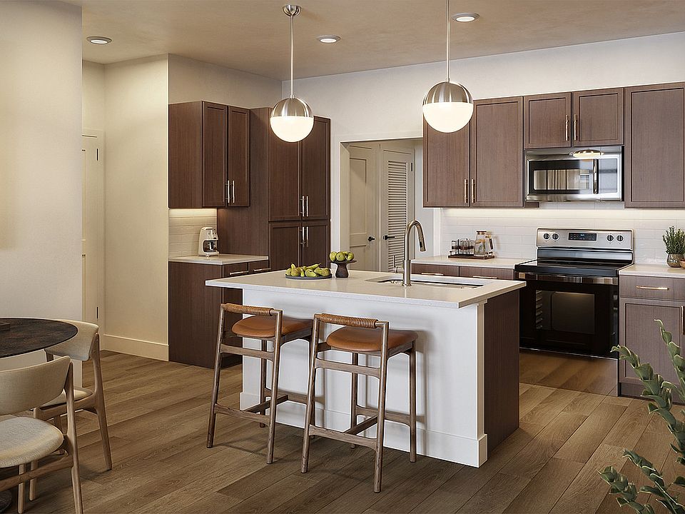 Experience culinary excellence in this stylish kitchen and dining space.