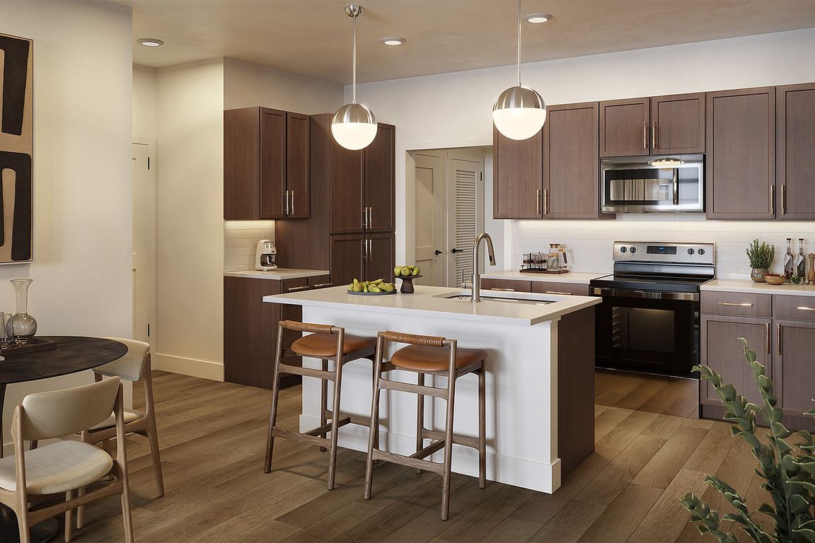 Experience culinary excellence in this stylish kitchen and dining space.