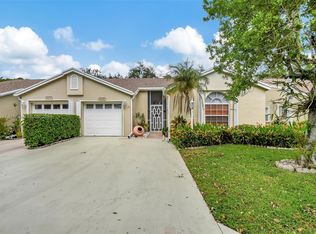 6205 Pond Tree Ct, Greenacres, FL 33463