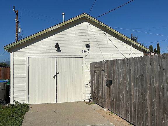 front of home (showing storage and fence yard to the right)