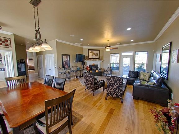 living area with formal dining space.  fireplace with pellet stove.