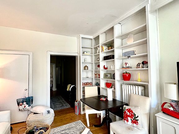 Built in bookshelves in spacious living room