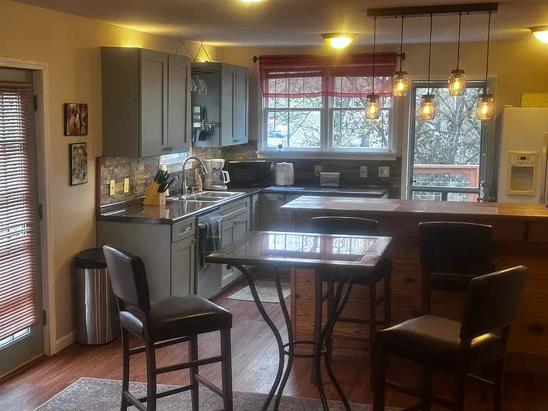 Dine at the table or counter with a fully-equipped kitchen.