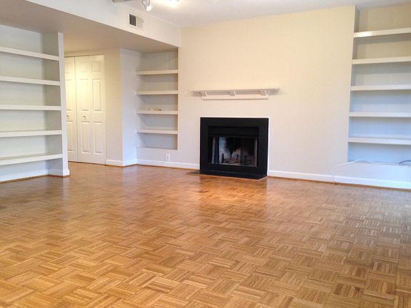 Living Room w/ wood-burning fireplace