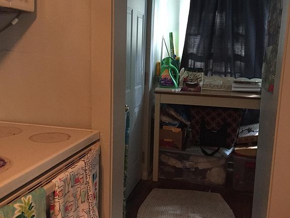 Storage nook off kitchen (door leads to back patio)