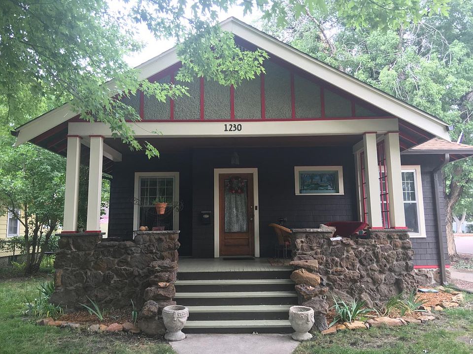 Front of house, covered stone porch