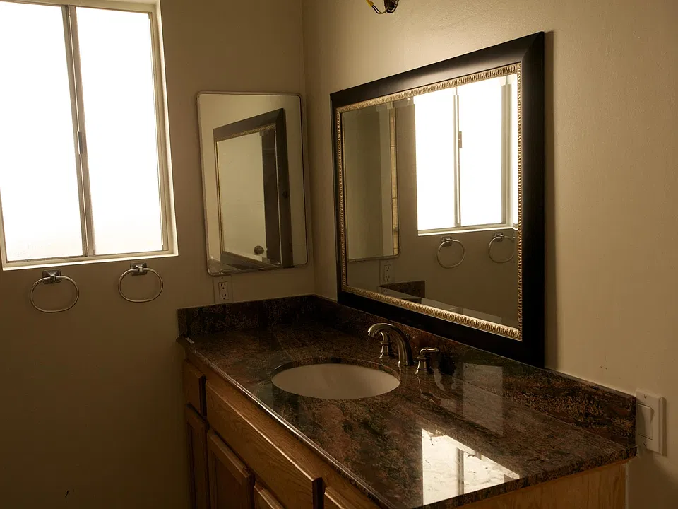 Master bathroom with tile flooring