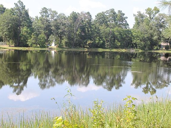 Acre lot on a private 7 acre lake.