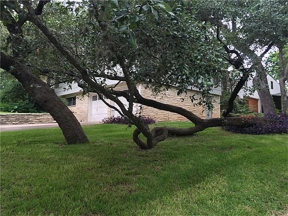 Beautiful corner lot, and the owner provides yard care!
