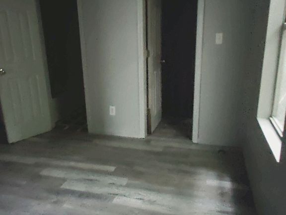 bedroom #2 with walk in closet & bathroom #2 entrance