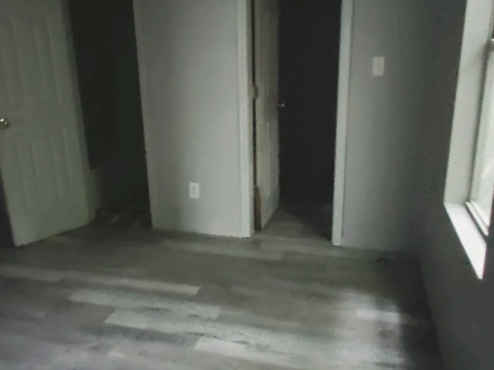bedroom #2 with walk in closet & bathroom #2 entrance