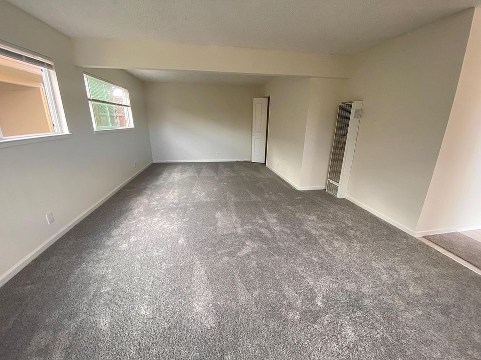 Living Room. The back area can be divided into an office space