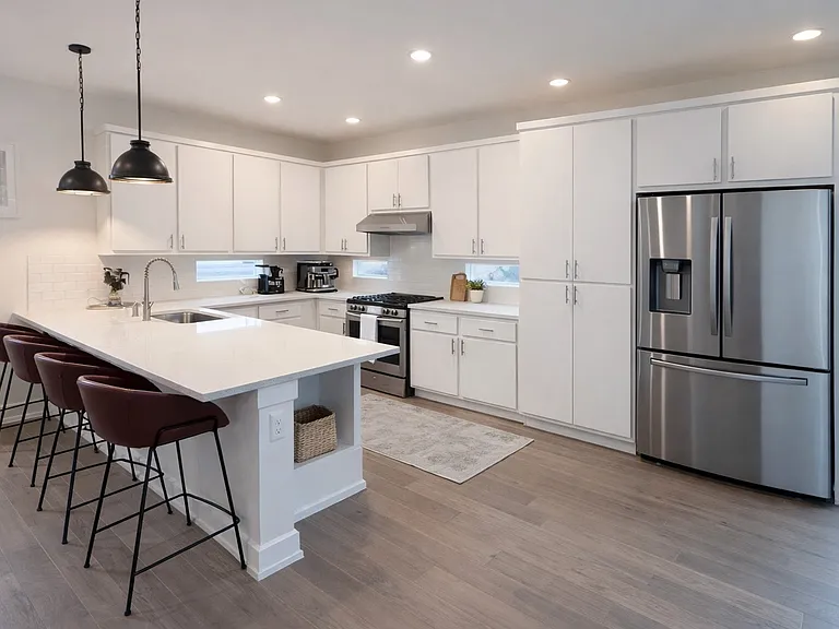 Large kitchen with modern finishes and ample storage