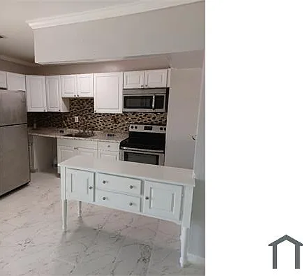 561 NW 21st Ct — Photo 6
