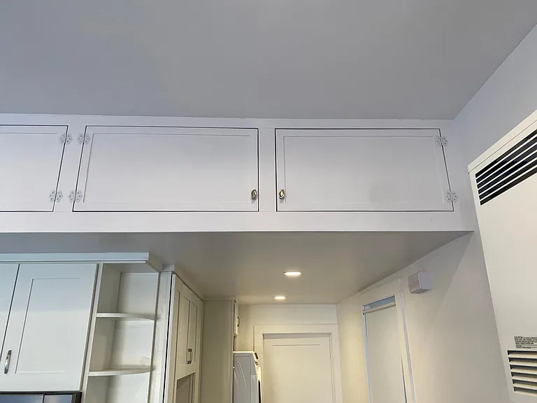 LARGE AUXILIARY STORAGE ABOVE KITCHEN