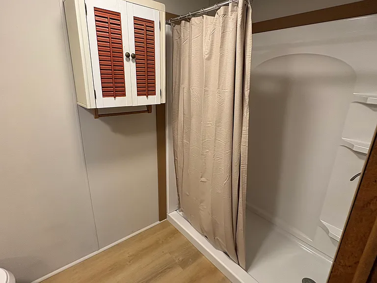 Master bathroom with new walk-in shower, new toilet, new sink