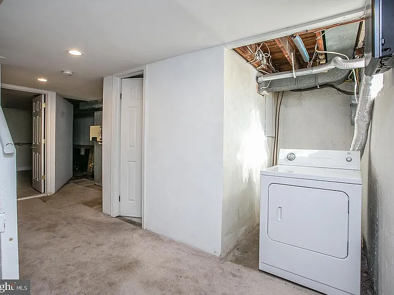 Laundry facilities and full size bathroom in the basement.